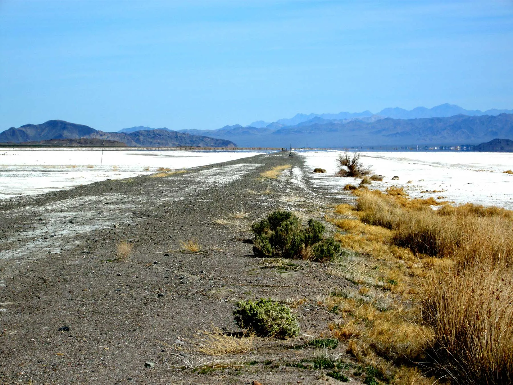 The old Tonopah and Tidewater railroad bed crossing the desert near Zzyzx